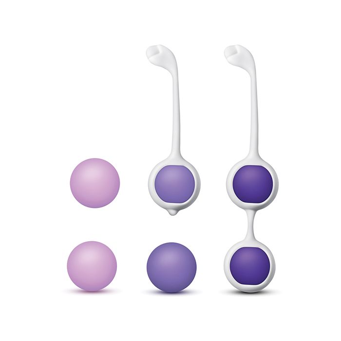 Three pairs of purple Kegel balls arranged from lightest to heaviest in the Wellness 3 Step Kegel Training Kit.