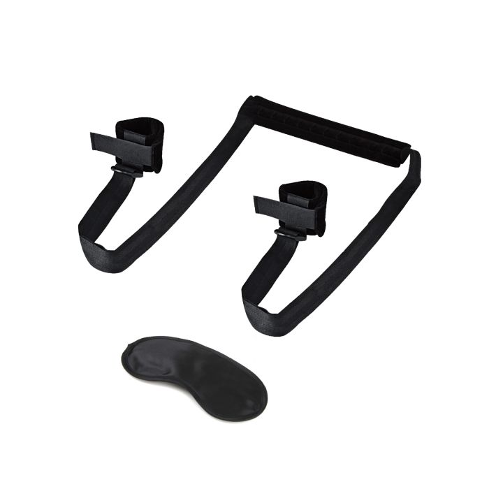 Adjustable position spreader strap displayed with free satin blindfold for sensory play