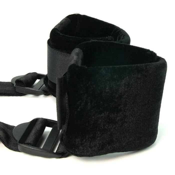 Close-up of soft padded cuffs on adjustable position spreader strap for comfortable leg support