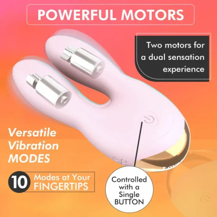 Close-up of Hear Me vibrator’s dual motors and LED backlight button in baby pink