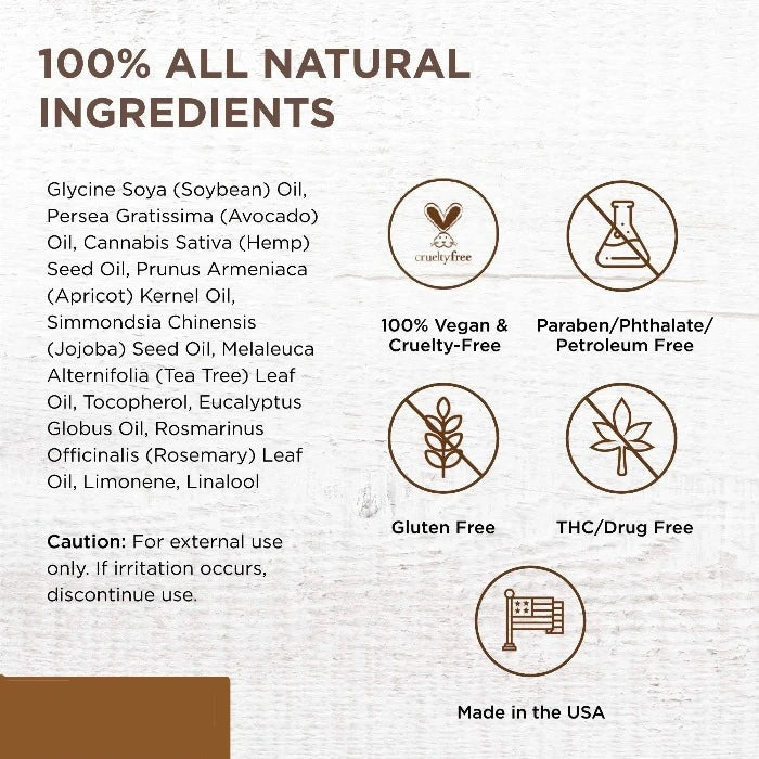 Miracle Oil 1oz bottle styled with fresh botanicals