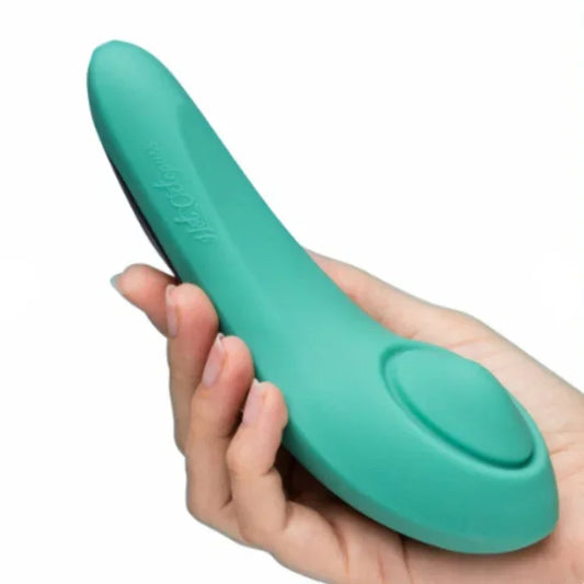 Close up of the pulse plate on the Pulse Queen toy held in a hand on a white background