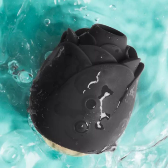 Rose Fifty Shades of Grey Hearts & Flowers clitoral suction stimulator in water, showing waterproof design
