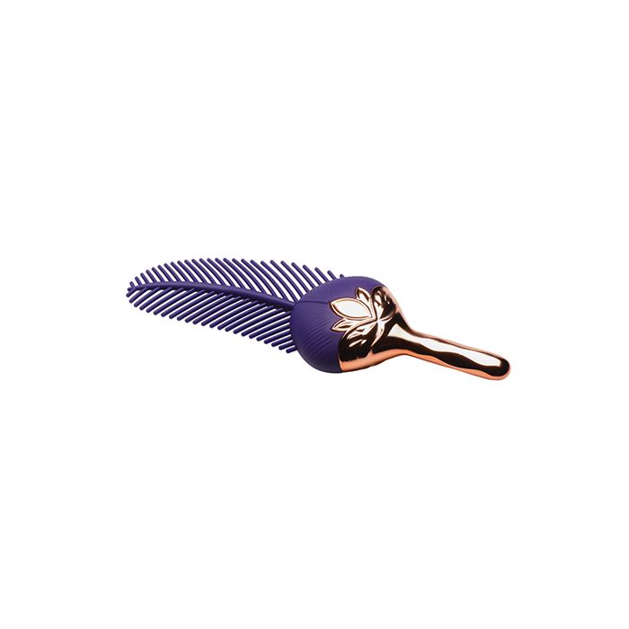 The Tickler Vibrating Silicone Feather photo of it laying on the side