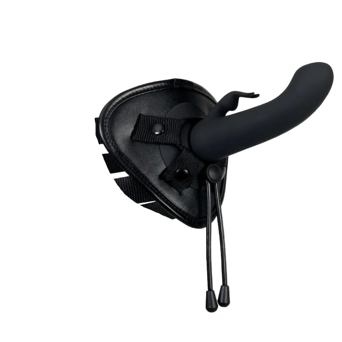 Side view of Evolved Heavenly Harness showing curved G-spot rabbit silicone sleeve attachment with adjustable black straps