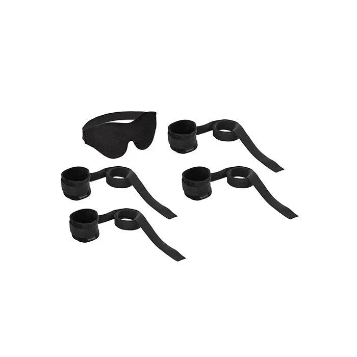 Four adjustable bondage cuffs and black sensual blindfold set from Sportsheets shown on white background
