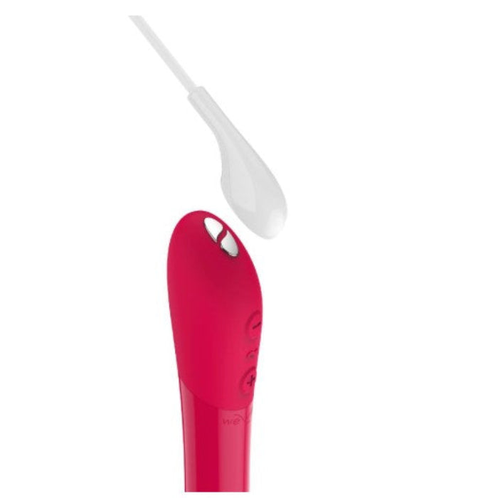 Showing how the We-Vibe Tango X connects to the included USB charging cable, demonstrating rechargeable feature.