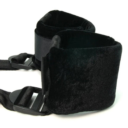 Close-up of soft padded cuffs on adjustable position spreader strap for comfortable leg support
