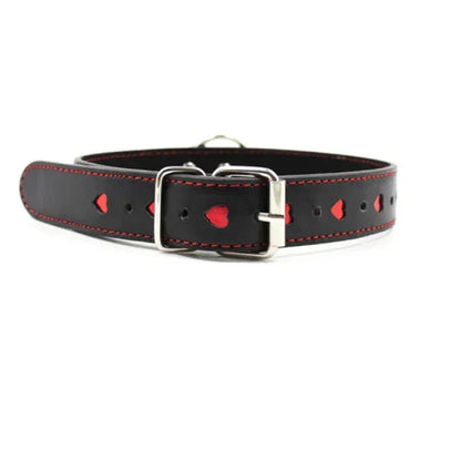 Close-up of the Plesur ornate PU leather heart collar buckle strap, highlighting the adjustable holes, metal buckle, and heart detailing near the closure.