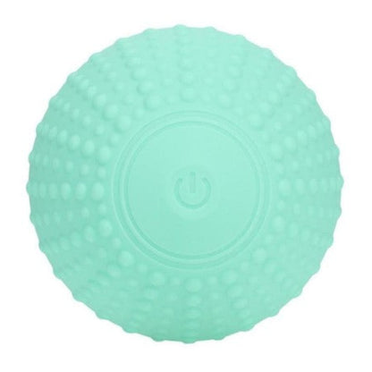 Close-up of ComfortPulse handheld vibrating massager control button for powering on/off and cycling through 10 vibration modes