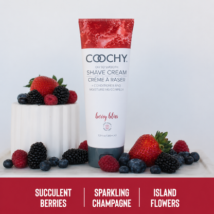 COOCHY Berry Bliss Shave Cream 7.2 oz surrounded by fresh strawberries, raspberries, blackberries, and blueberries highlighting its fruity berry fragrance notes.