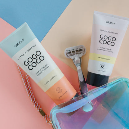 Coochy Ultra Hydrating Shave Cream and Ultra Smoothing Body Scrub in mango coconut scent with razor in holographic cosmetic bag