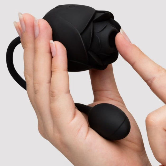 Fifty Shades of Grey Dark Blushing Rose product in hand to show compact size and ergonomic shape.