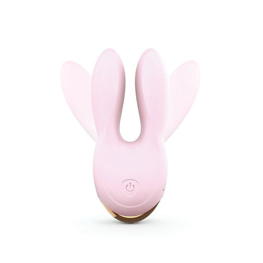 Love to Love Hear Me baby pink clitoral stimulator and vibrator with flexible bunny ears on white background