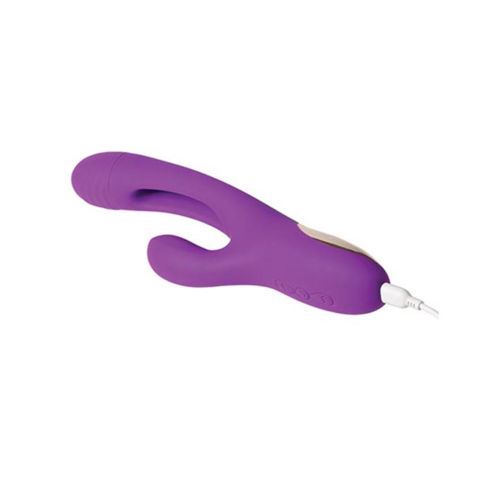 Honey Play Box Bora Rabbit Tapping G-Spot vibrator plugged in and USB charging with magnetic snap-on charger