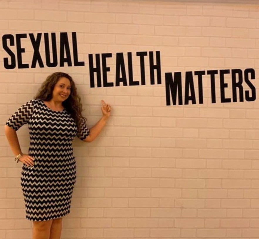 Linda Koontz smiling warmly, founder and CEO of The Flirtation Station, sexual wellness expert.