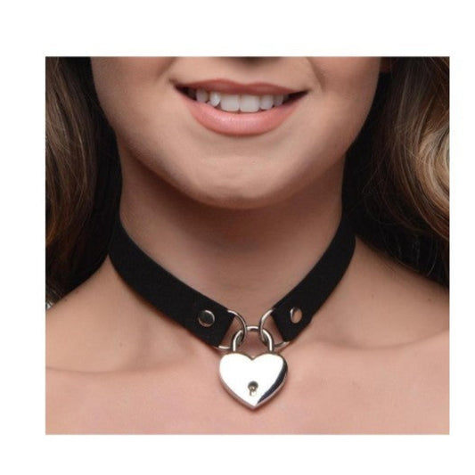 Woman wearing black Lock-It Heart Choker with key, styled as a subtle day collar with lingerie