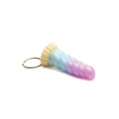 Pastel-colored Mystique Unicorn Silicone Keychain by XR Creature Cocks, a mini unicorn horn made of body-safe silicone with nickel-free metal keyring