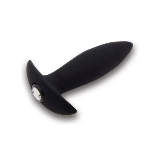 Detailed view of Nu Sensuelle Mini Plug's silicone texture and control button.
