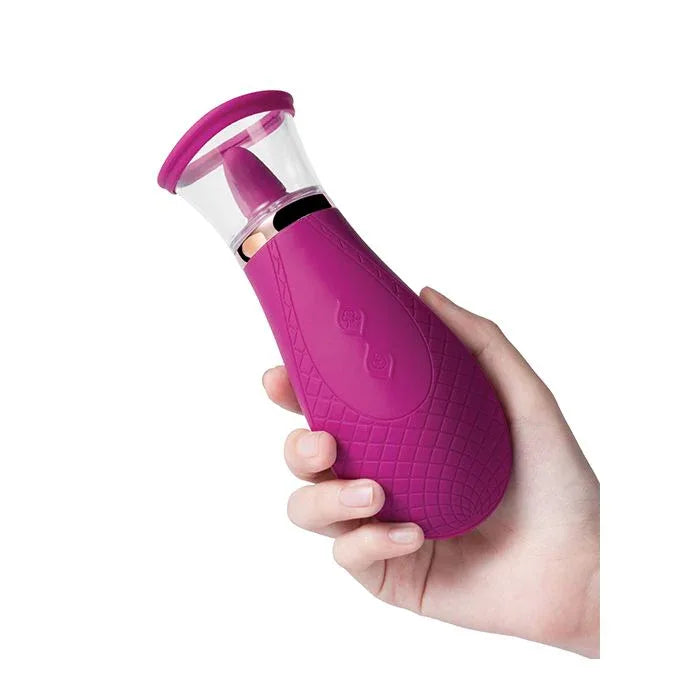 Wine Purple Scioness clit sucker and licker stimulator held at angle highlighting 9 licking modes texture