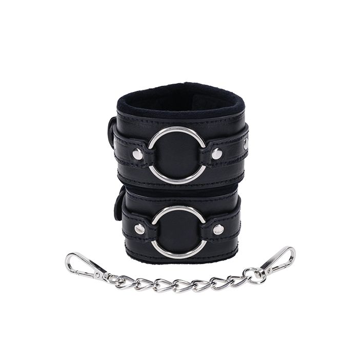 Close-up of Sportsheets Shadow Handcuffs showing plush faux fur lining and metal O-rings