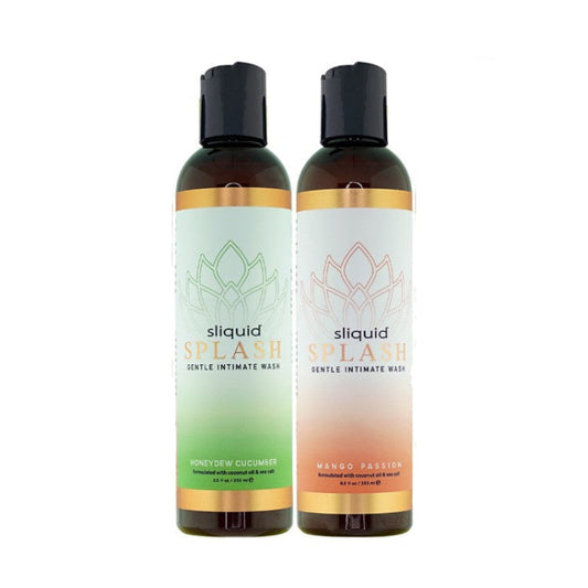 Two bottles of Sliquid Splash intimate wash in Honeydew Cucumber and Mango Passion scents standing side by side, highlighting the gentle, pH-balanced, glycerin-free formula.
