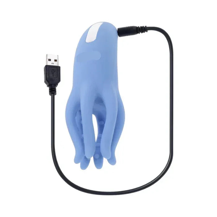Waterproof Tentacle Tickler vibrator being charged with included USB cable