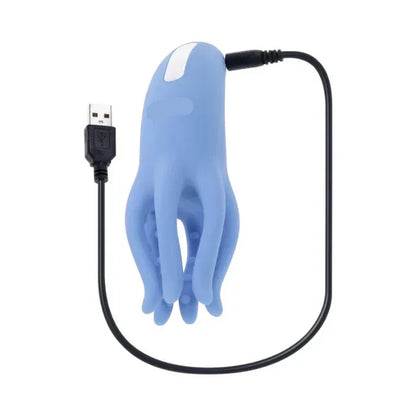 Waterproof Tentacle Tickler vibrator being charged with included USB cable