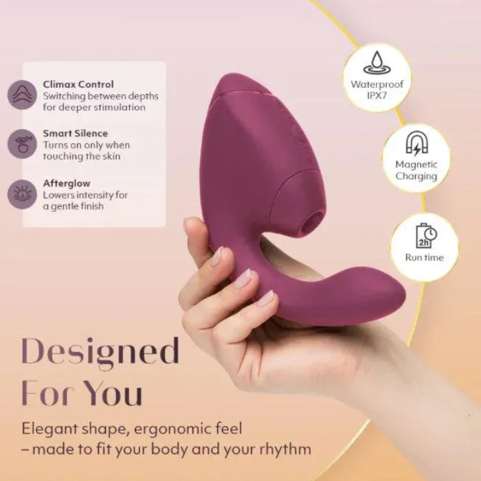 Womanizer Next Duo in burgundy showcasing key features: Climax Control for deeper stimulation, Smart Silence activation, Afterglow for gentle finish, IPX7 waterproof rating, and magnetic USB charging - elegant ergonomic design made to fit your body and rhythm