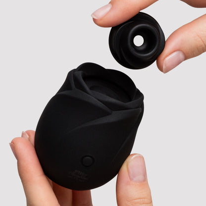 Fifty Shades of Grey Black Rose 2.0 clitoral suction stimulator showing removable silicone suction head and rose-shaped opening.