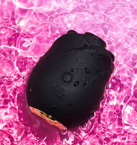 Fifty Shades of Grey Black Rose 2.0 waterproof black silicone suction toy on pink water background