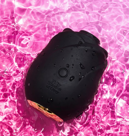 Fifty Shades of Grey Black Rose 2.0 waterproof black silicone suction toy on pink water background