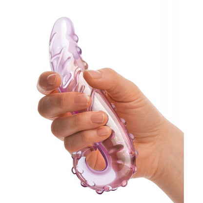 Woman holding Lick-It Glass Wand showing textured bumpy shaft and curved whimsical design
