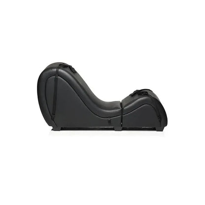 Side profile of the Master Series Kinky Couch black sex chaise lounge showing its curved ergonomic shape and detachable furniture design.