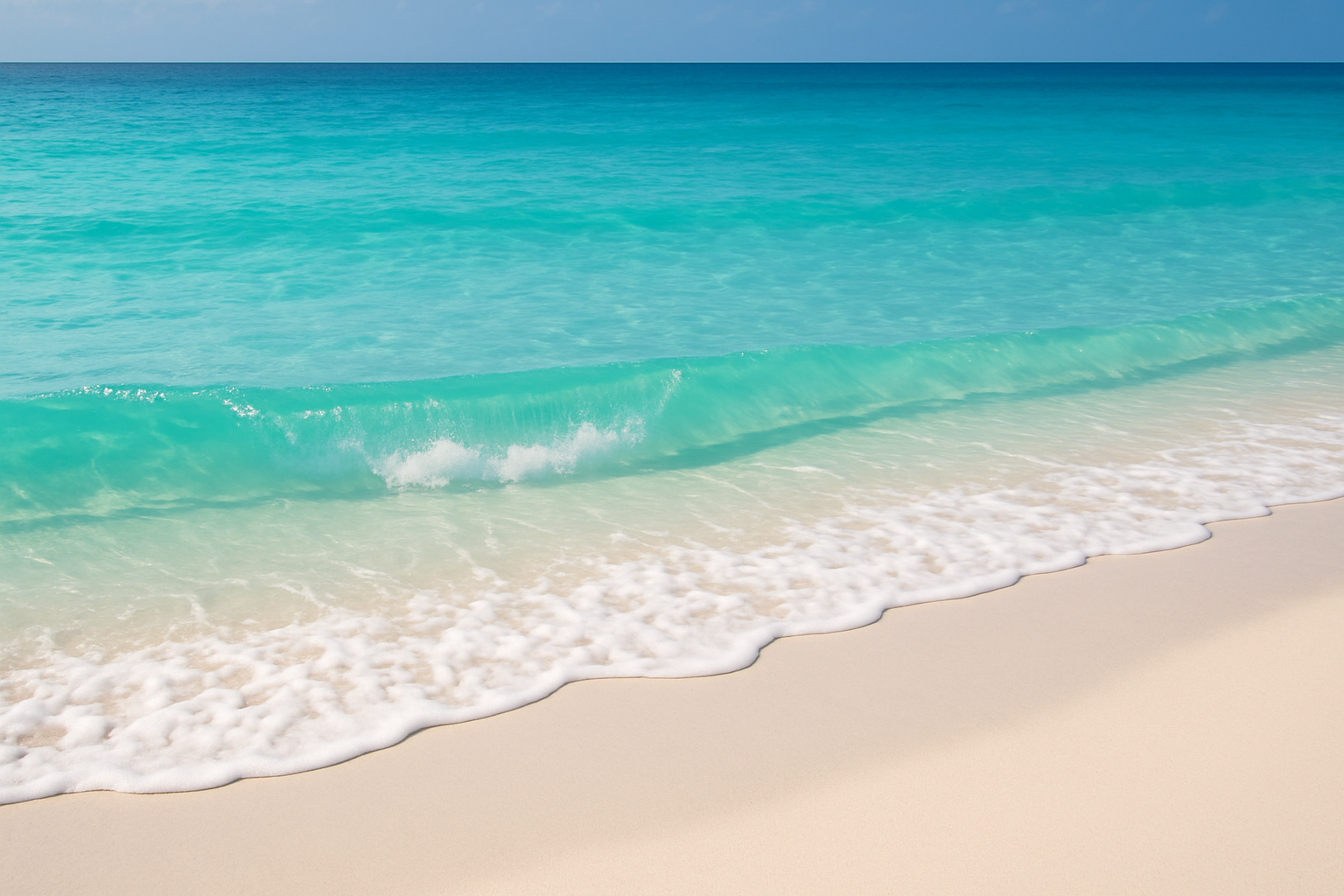 Florida beach with turquoise water and white waves crashing onto the sandy shore.