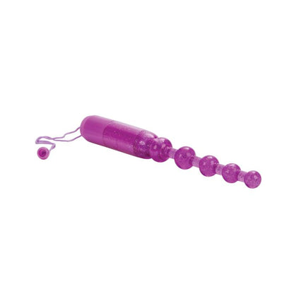 Purple vibrating anal beads by California Exotics for safe and comfortable backdoor play