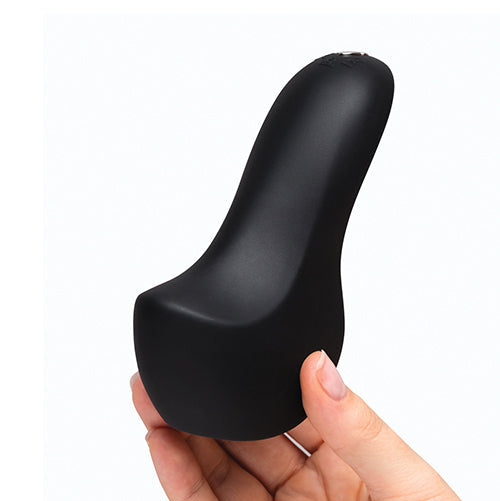 Black We-Vibe Shared Touch couples vibrator held in one hand to demonstrate its curved, ergonomic design and size.