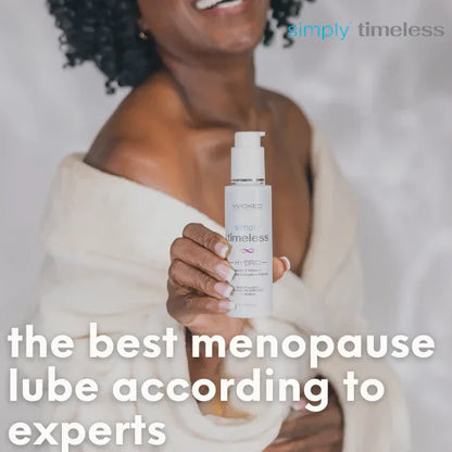 Woman holding Simply Timeless Hybrid + DHEA menopause lubricant with DHEA for vaginal dryness relief